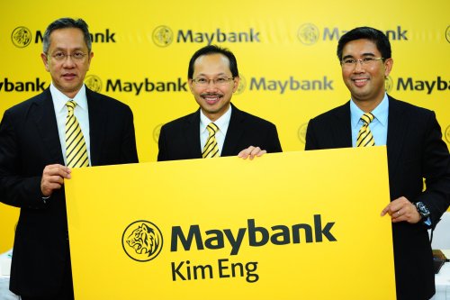 Unveiling the new Maybank Kim Eng Corporate Identity (From Left to Right) - Mr. Ronald Ooi, Dato' Sri Abdul Wahid Omar, Tengku Dato' Zafrul bin Tengku Abdul Aziz